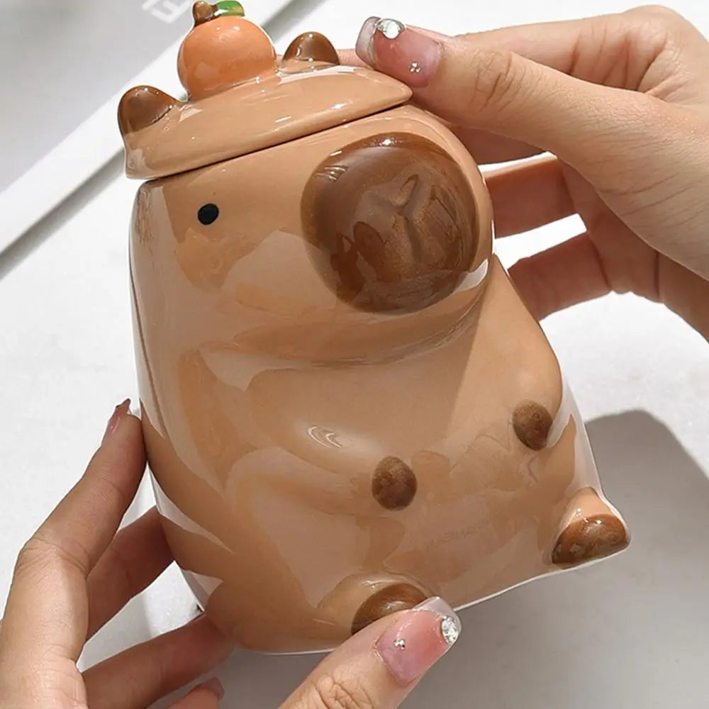 CozyCapy™ Ceramic Mug with Lid – Whimsical Capybara Christmas Cup (14oz)