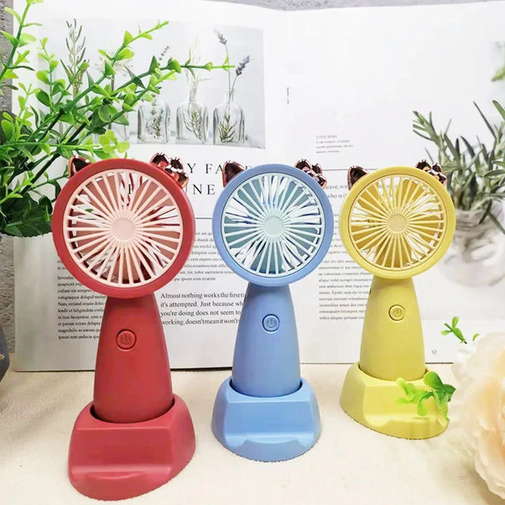 USB Mini Handheld Fan Outdoor Mini Creative Desktop Office Mute Charging Portable Handheld Fan Yellow