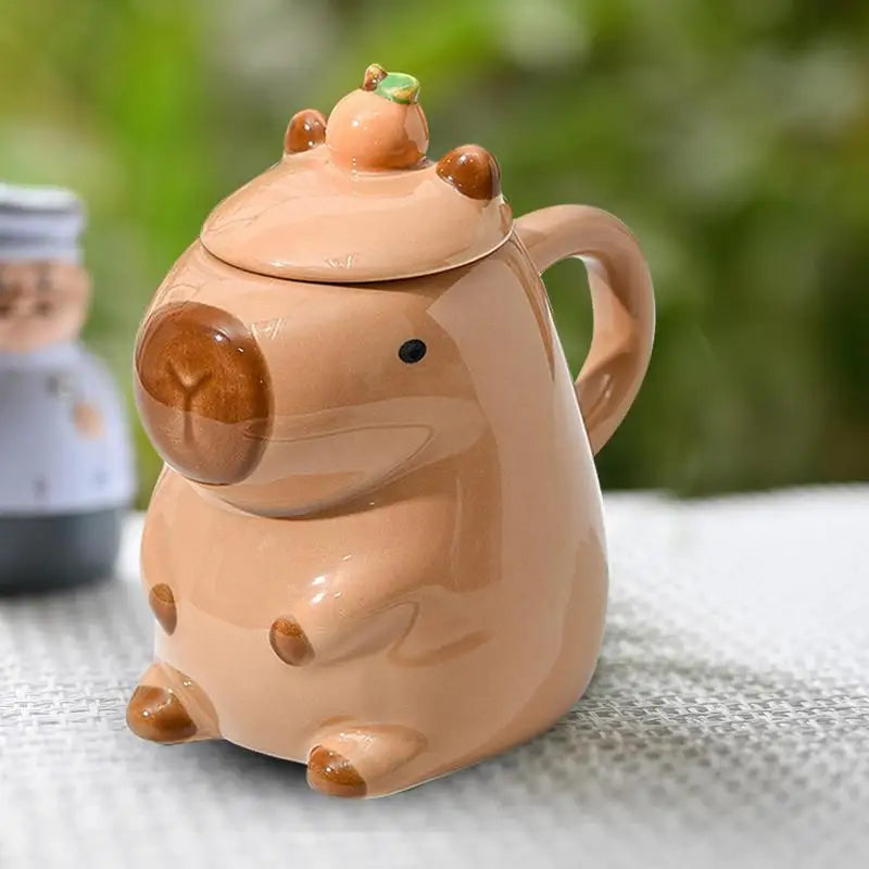 CozyCapy™ Ceramic Mug with Lid – Whimsical Capybara Christmas Cup (14oz)